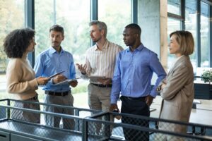 business meeting manager discussing work with his colleagues 484651 24802