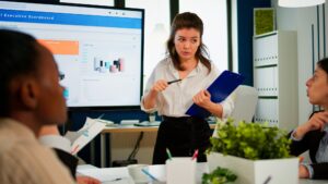 business partners planning strategy meeting conference working with digital interactive whiteboard discussing project statistics sharing ideas corporate staff talking new business application 482257 13908