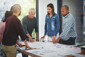 business people architect discussion meeting with blueprint building project brainstorming diversity architecture employees collaboration with paperwork boardroom proposal 590464 372031