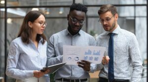 business team reviewing financial charts office environment 1021802 42799