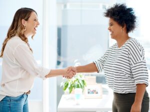 business women handshake diversity with welcome agreement choice office promotion people employees colleagues onboarding partnership negotiation meeting company 590464 402846