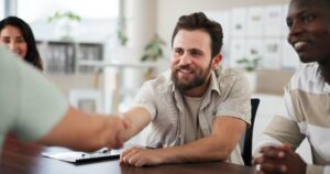 creative business people team handshake agreement cooperation conflict resolution smile group shaking hands collaboration b2b deal negotiation success startup funding 590464 525187