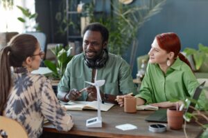 diverse team business people meeting table green office 236854 59330 1