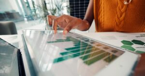 document data hands with tablet screen office risk management sustainability esg consultant paperwork person with tech environmental benefits renewable energy 590464 549250