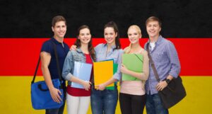 education learning people concept group smiling students with folders school bags german flag background 380164 112354