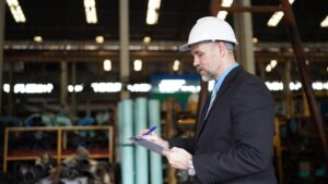 factory manager businessman inspecting factory industry plantfactory indusrty business 35752 12832