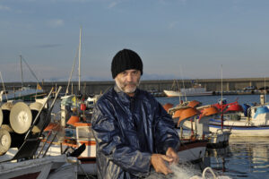 fisherman working fishing port 67651 1582