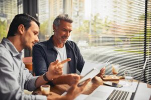 meeting tablet business people coffee shop paperwork teamwork financial investment cafe beverage budget analyst with economist reading research planning startup project 590464 472431