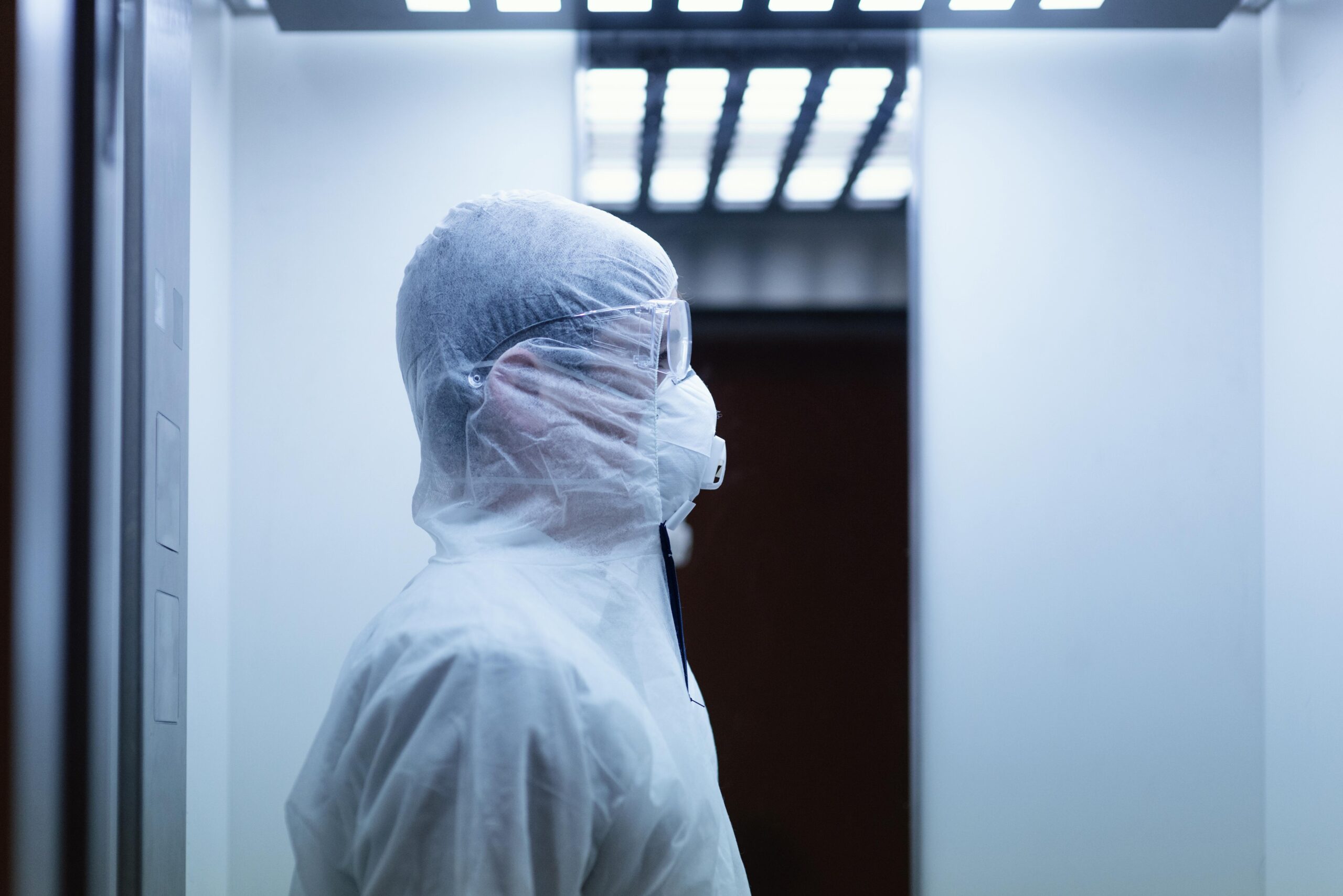 person wearing prevention suit against bio hazard scaled