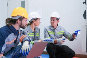 professional engineer workers training testing machine industry factory concept people operation industrial industry robot programming software automated manufacturing technology 28976 2506
