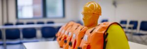 row life jackets hard hats table classroom setting symbolizing workplace saf 924727 84299 1